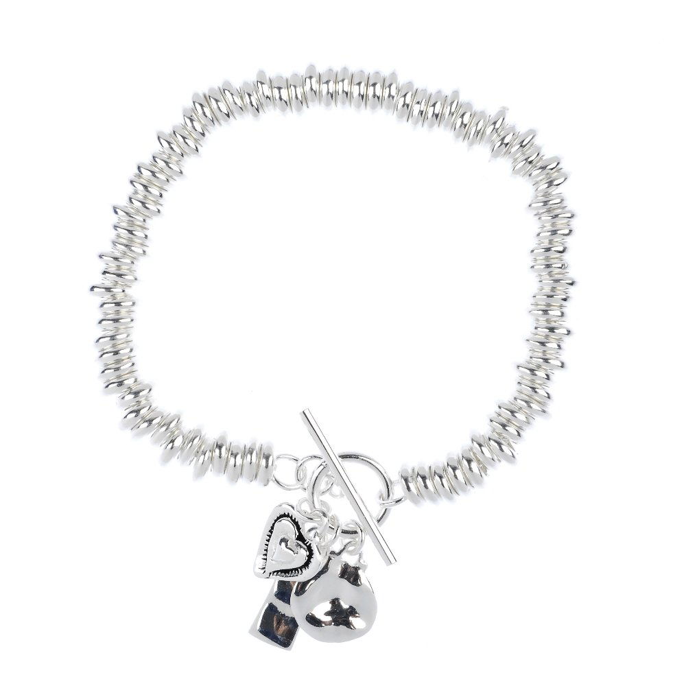 LA ROCKS - two silver bracelets and three pendants: * LA ROCKS - two silver bracelets and three pendants. To include two elasticated circular-link bracelets, with three suspended charms and three heart design token pendants and faceted pink gem pendant