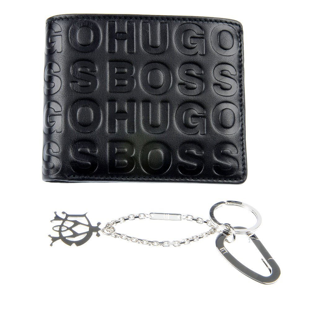 A group of four giftwear items.: * A group of four giftwear items. To include a rectangular-shape photograph frame, a Hugo Boss wallet, a Dunhill key ring and a mirror compact by Vera Wang, for Wedgwood. AF.