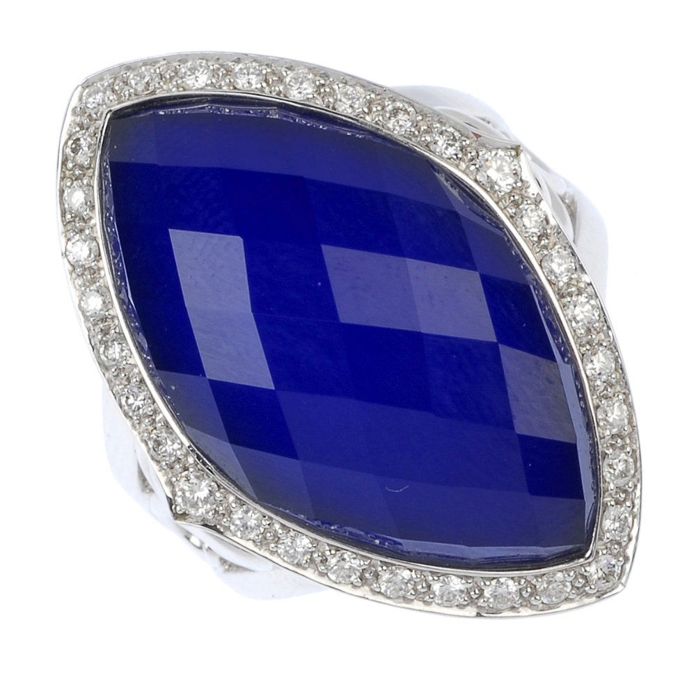 STEPHEN WEBSTER - an 18ct gold 'Crystal Haze' lapi: * STEPHEN WEBSTER - an 18ct gold lapis lazuli, quartz and diamond 'Crystal Haze' ring. The marquise-shape lapis lazuli, with faceted quartz top, within a brilliant-cut diamond surround, to the bifurca