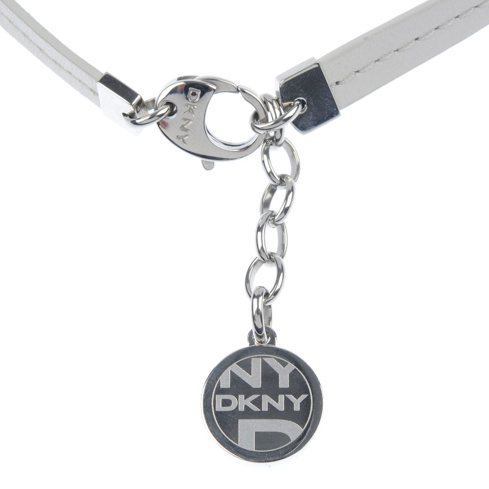 A selection of designer and other jewellery.: * A selection of designer and other jewellery. To include a gentleman's Emporio Armani steel and leather bracelet, a DKNY steel collar, a Guess steel bracelet, three pairs of cufflinks, together with