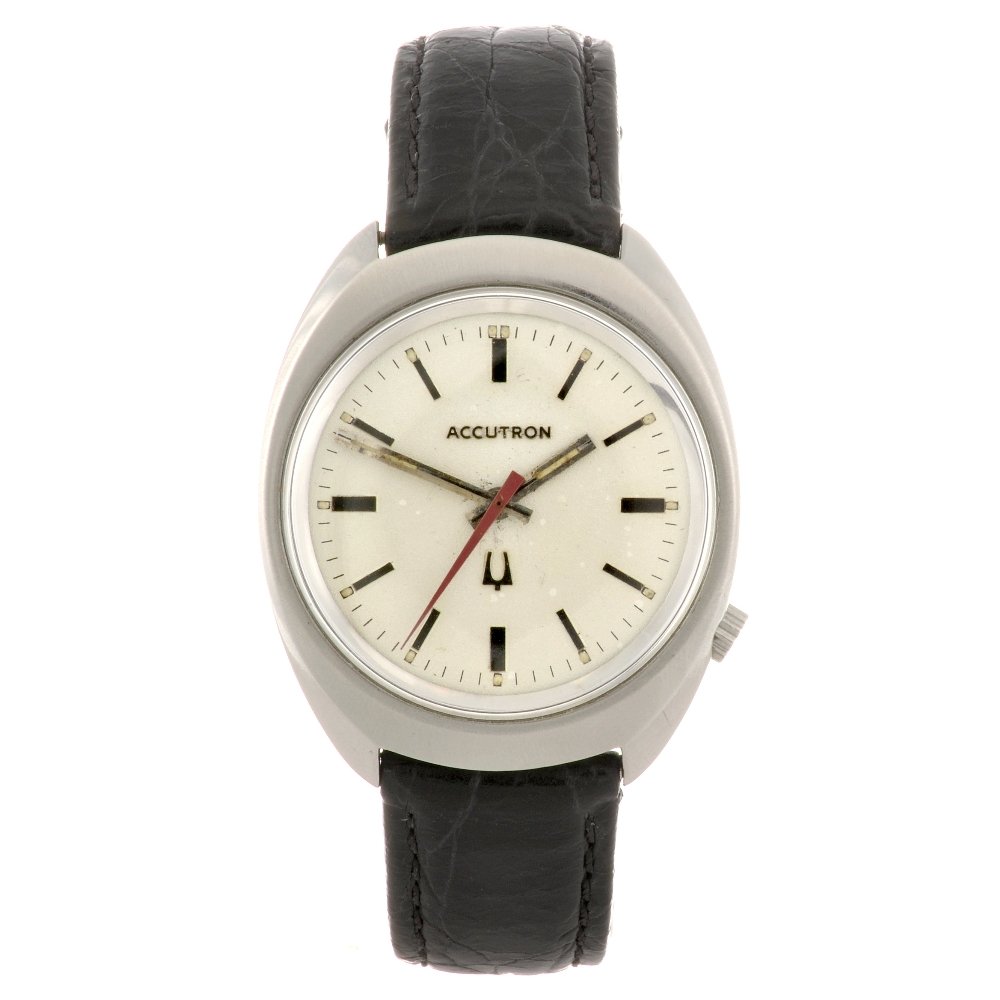 A base metal electronic gentleman's Bulova Accutron: BULOVA - a base metal electronic gentleman's Accutron wrist watch, the silvered dial with hourly applied batons, bordered by a minute track, tonneau shaped case with stainless steel rear, numbered J17
