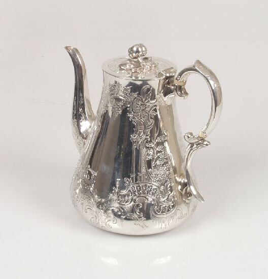 A Victorian coffee pot of bulbous form: A Victorian coffee pot of bulbous form with engraved floral and classical decoration, fruit finial and scroll handle, makers Charles and George Fox, London 1843 - 24ozt.