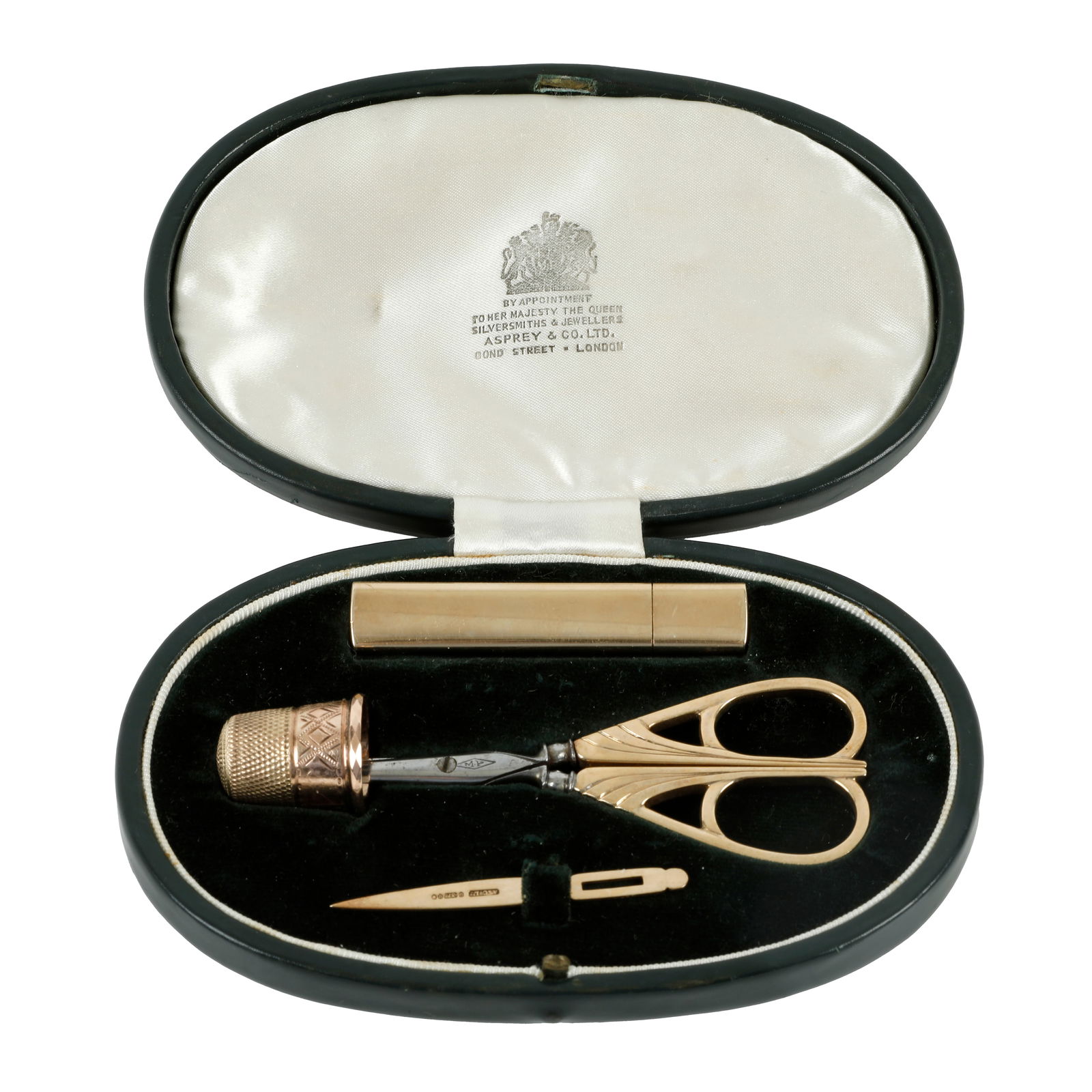 9ct Asprey sewing kit: 9ct Asprey sewing kit A cased Asprey & Co sewing set comprising a 9ct gold needle case, 9ct gold bodkin and a pair of 9ct gold handled scissors with French steel blades, together with an associate