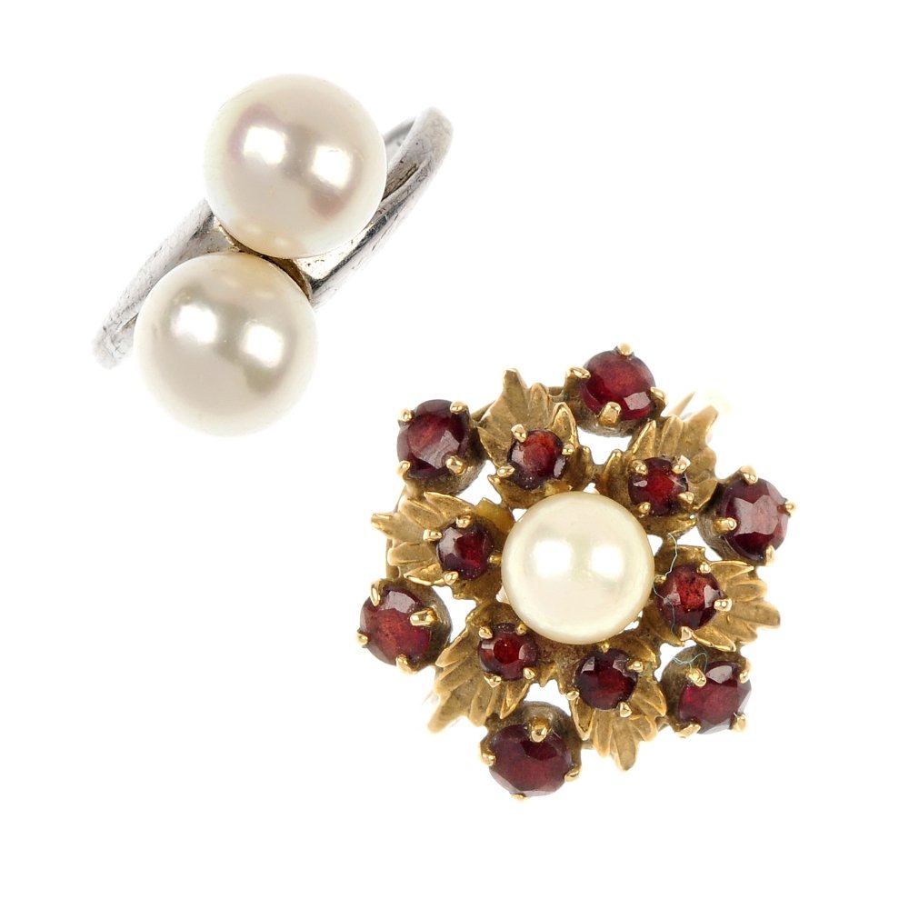 A cultured pearl and garmet cluster ring.: A cultured pearl ring, by Mikimoto and a 9ct gold gem-set cluster ring. The first designed as two cultured pearls with asymmetric shoulders, the second designed as a cultured pearl within a circular-s