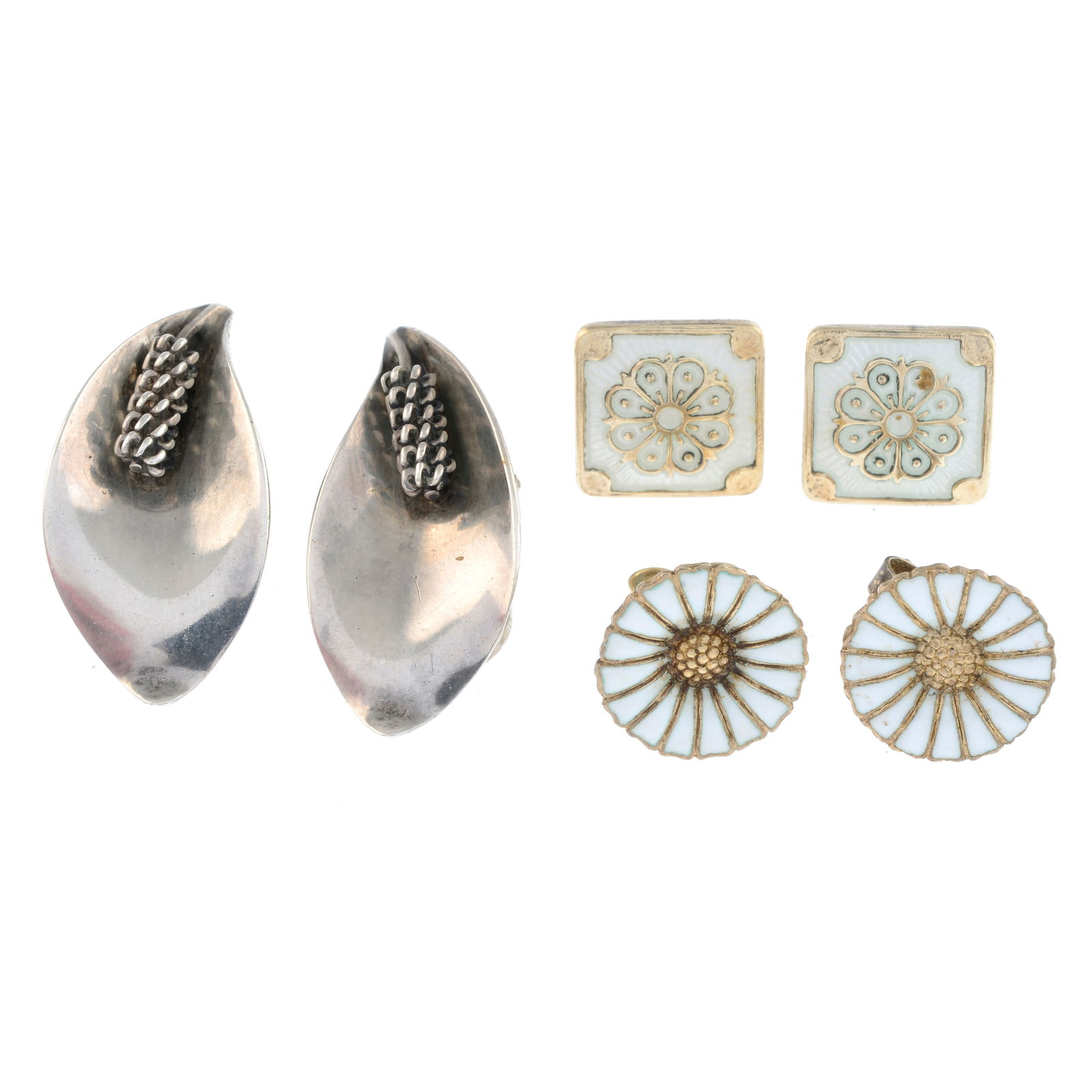 Three pairs of floral earrings: Three pairs of floral earrings To include a pair of floral clip earrings, by Aarre & Krogh Eftf, a pair of stylised white enamel floral earrings, by David Andersen, and a pair of white enamel flor