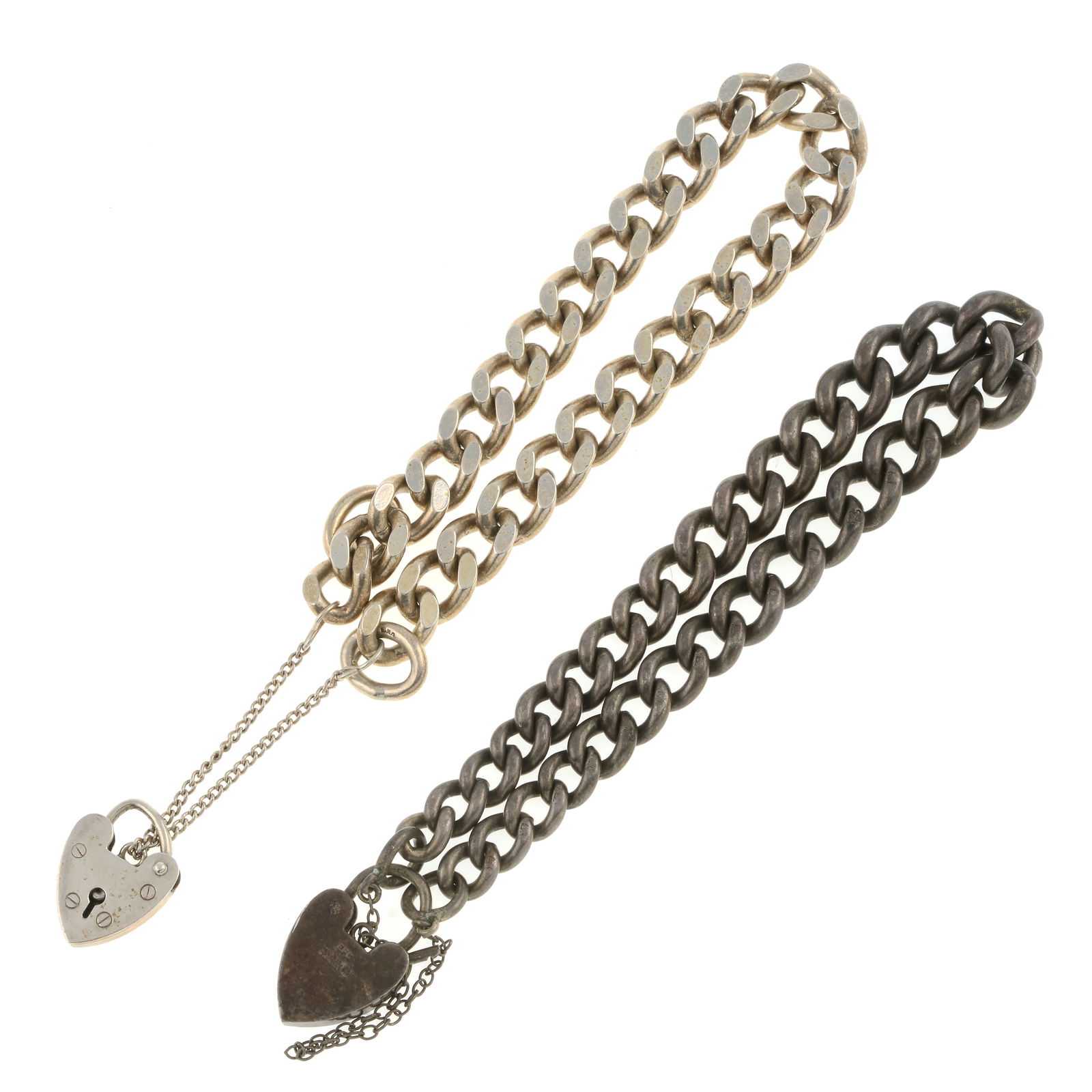Two silver chain bracelets: Two silver chain bracelets Hallmarks for Birmingham, 1973 and 1978. Condition Report: General marks, wear, discolouration and dents in keeping with general age and wear. Condition reports are offered