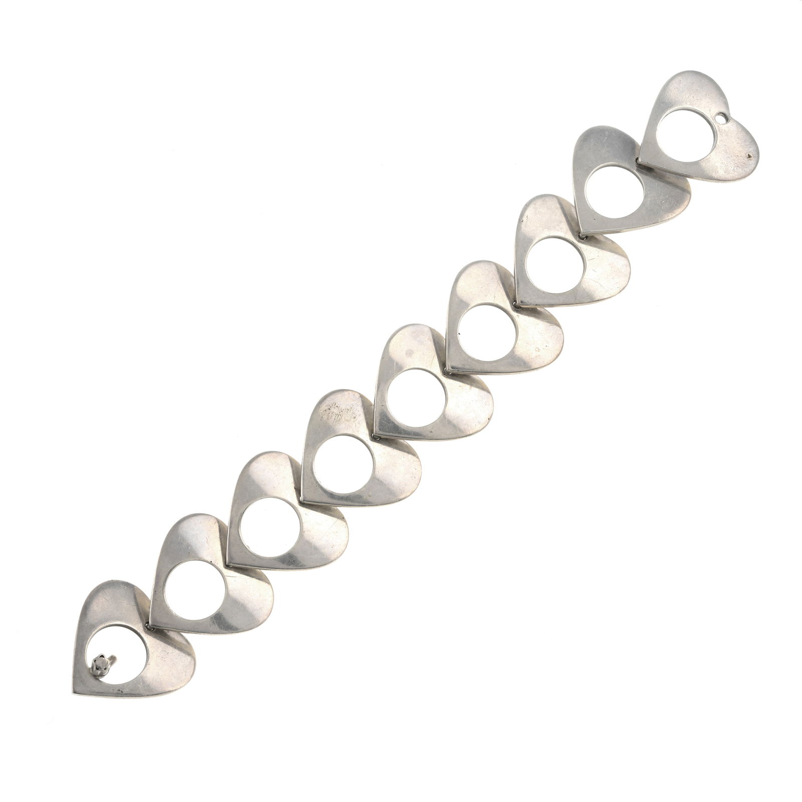 Silver heart bracelet, by Bent Knudsen: Silver heart bracelet, by Bent Knudsen Import marks for London. Condition Report: Some surface scratches/wear and areas of minor discolouration. Condition repo