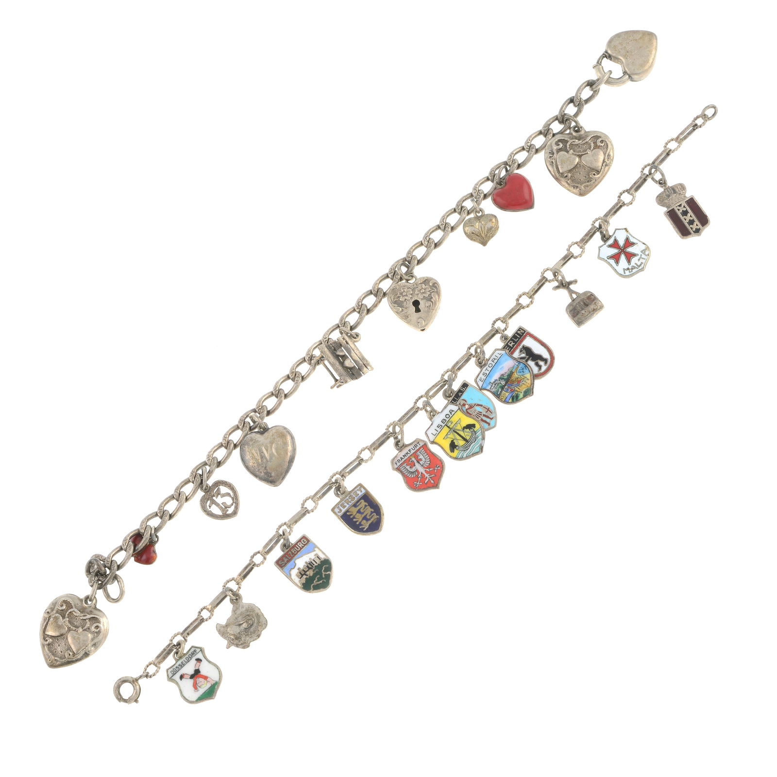Two mid 20th century charm bracelets: Two mid 20th century charm bracelets Both chains and some charms with marks to indicate silver. Condition Report: Due to the amount of items in this lot we are unable to give a condition report.Please