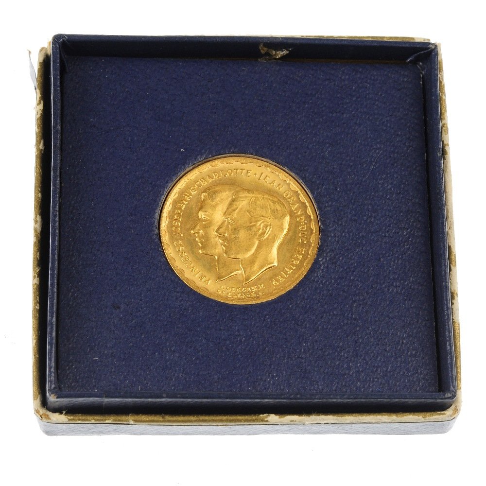 Luxembourg, Princess Josephine Charlotte and Heriditary: Luxembourg, Princess Josephine Charlotte and Heriditary Grand Duke Prince Jean, Marriage 1953, gold medal, 6.4g, in box of issue. Good extremely fine.