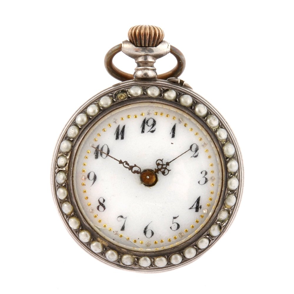 A continental metal keyless wind open face fob watch.: A continental metal keyless wind open face fob watch, the white enamel dial with hourly applied Arabic numerals, bordered by a minute track, round case with imitation seed pearl decoration to front, e