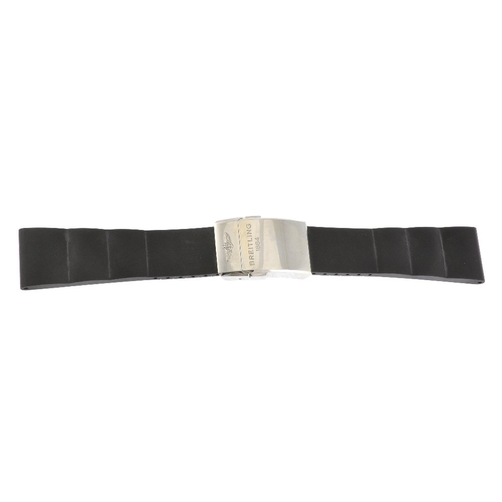 A Breitling watch strap and clasp.: A black rubber Breiltling for Bentley watch strap with stainless steel deployant clasp.