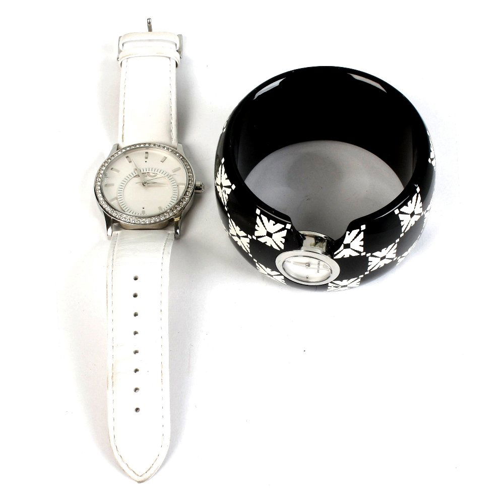 A bag of watches.: A bag of various watches, recommended for repair purposes only, to include DKNY and Armani. Approximately 100.