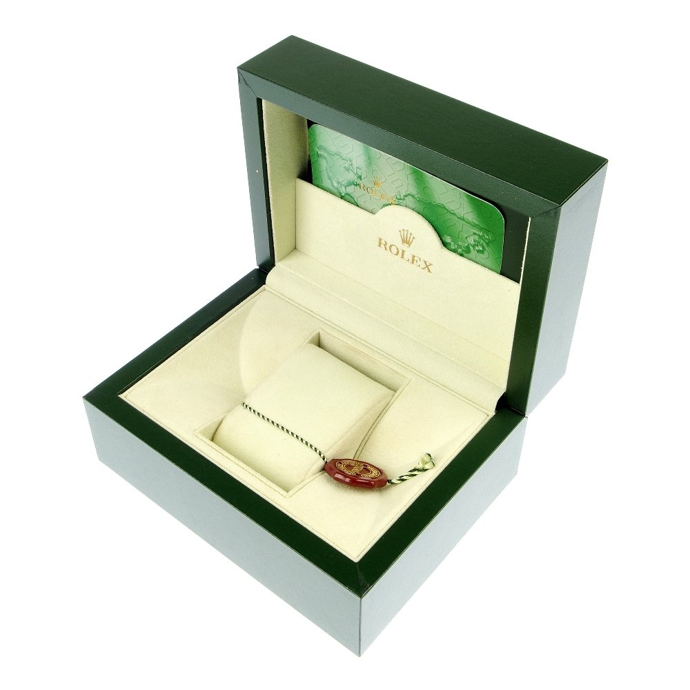 An complete Rolex watch box.