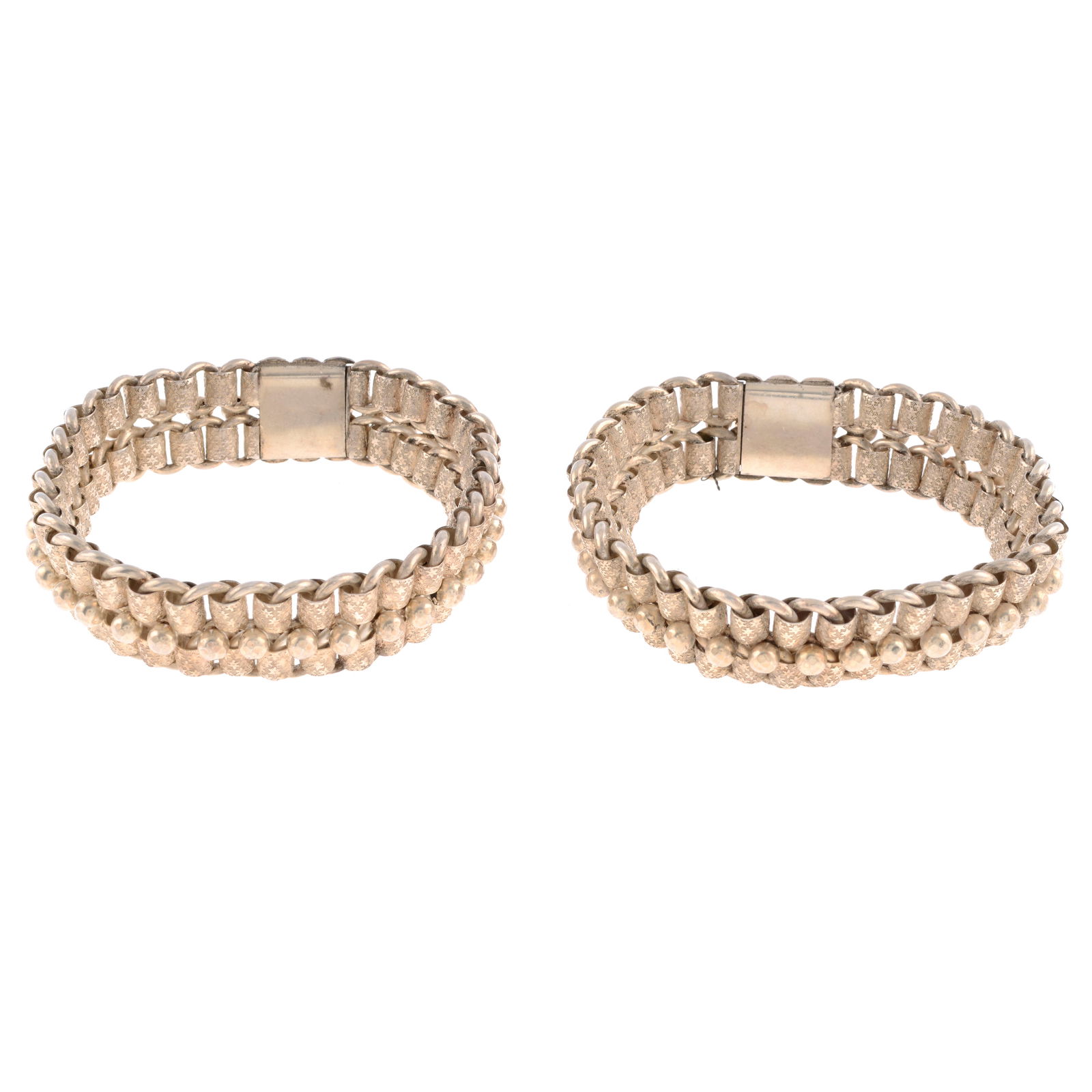 Two Victorian fancy-link chain bracelets: Two Victorian fancy-link chain bracelets Bracelets may be joined to be worn as a necklace. Condition Report: General marks, wear, discolouration and dents in keeping with general age and wear. Width a