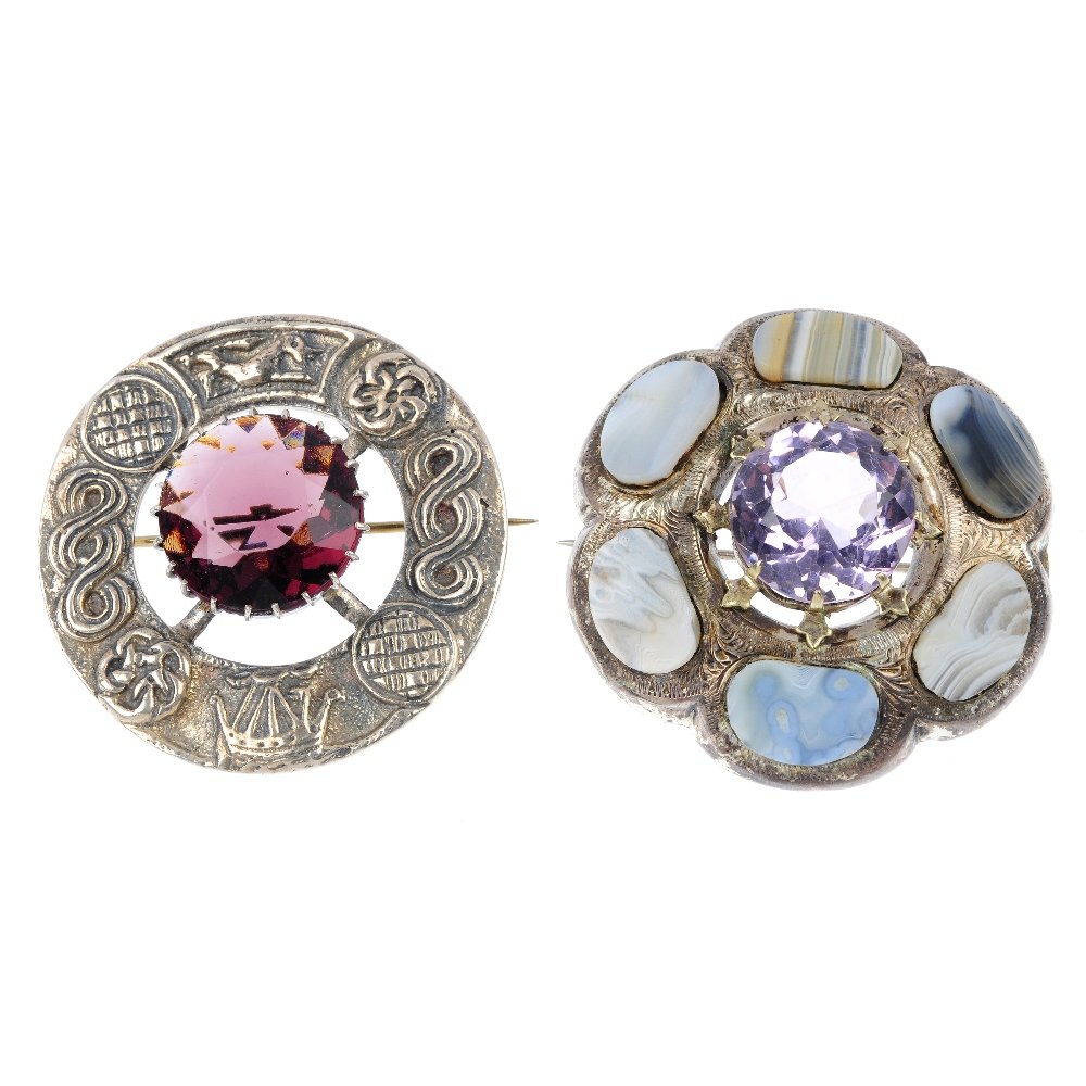 Two early 20th century Scottish brooches.: Two early 20th century Scottish brooches, to include a silver purple paste wreath brooch, together with a circular-shape amethyst and banded agate cluster brooch. The first with hallmarks for Glasgow,