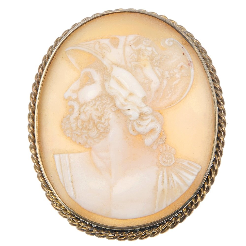 A selection of jewellery: A selection of jewellery, to include an oval shell cameo, depicting Ares in profile, within a rope-twist surround, a mid 20th century marcasite fob watch with bow surmount and three further items. (5)