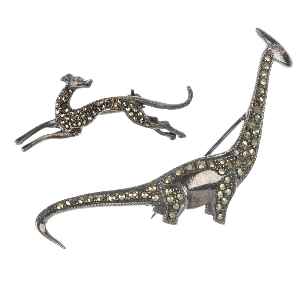 A selection of silver, white metal and base metal marca: A selection of silver, white metal and base metal marcasite jewellery, to include a dinosaur brooch. Total weight 600gms.
