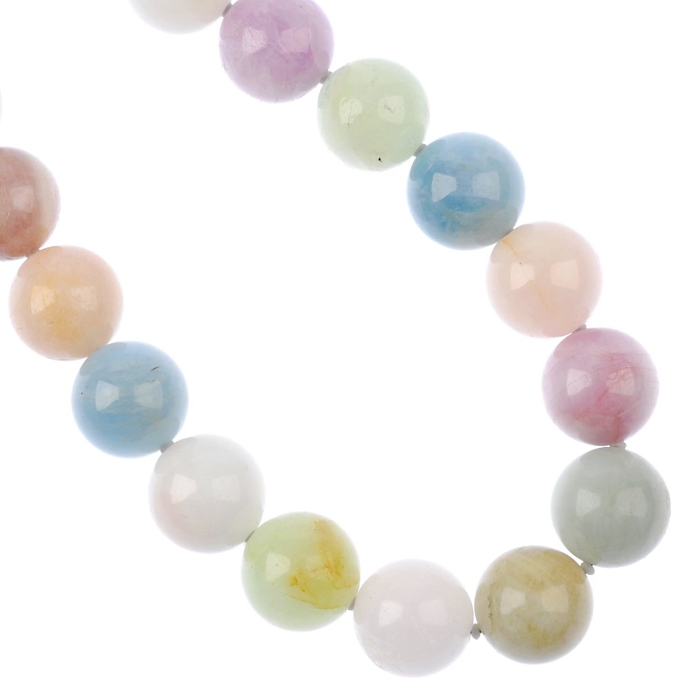 A morganite and aquamarine beryll ball bracelet and nec: A multi-gem necklace and matching bracelet, each designed as a series of multi-gem beads, measuring 4mms, to include morganite and aquamarine, to the push piece clasp. Length of necklace 46cms. Length