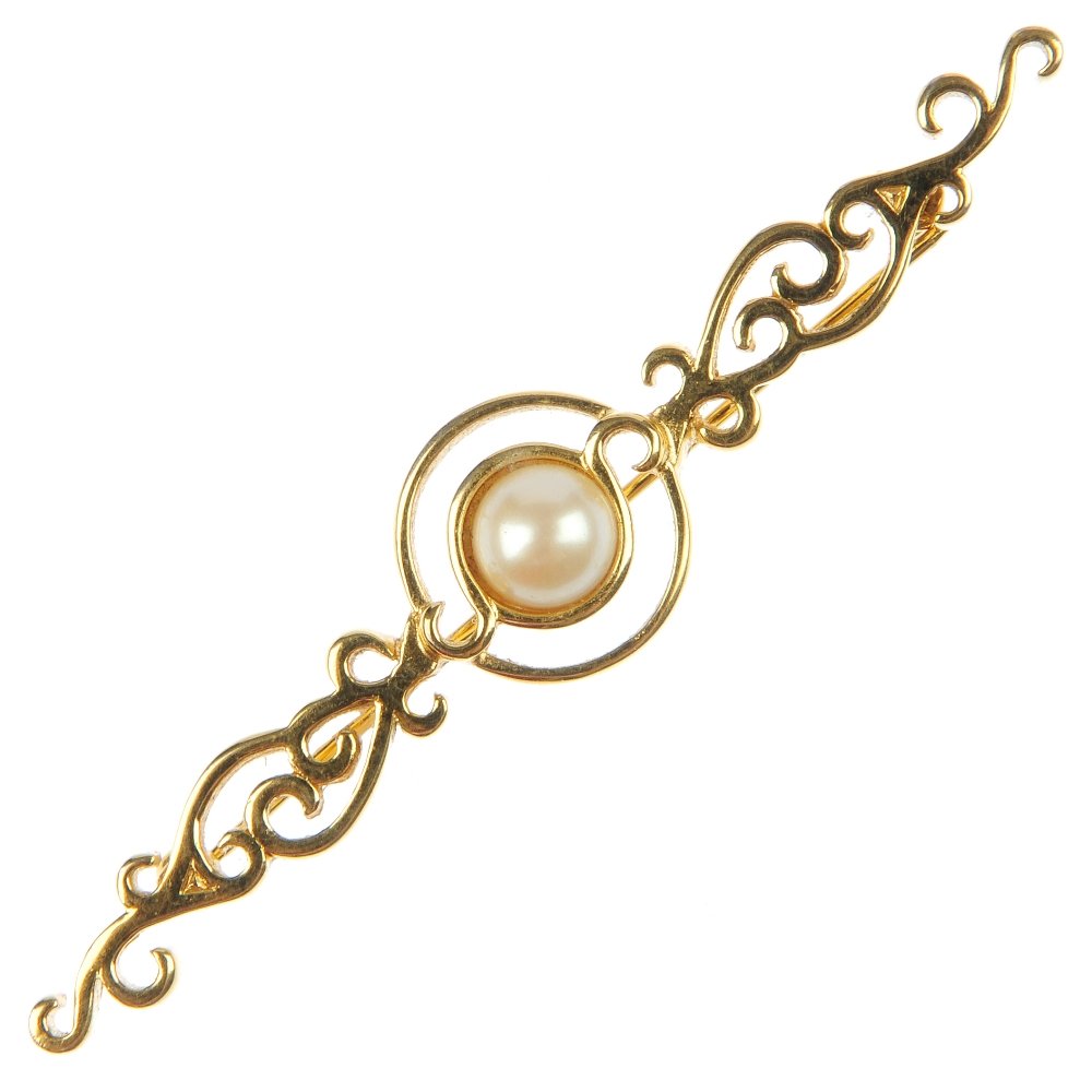 A selection of designer costume jewellery.: A selection of designer costume jewellery, to include a Monet imitation pearl bar brooch of scroll design, a set of D'Orlan imitation pearl and colourless paste jewellery and a Pierre Cardin bamboo ne