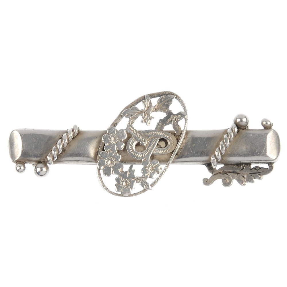 A selection of silver and costume jewellery.: A selection of silver and costume jewellery, to include an early 20th century silver bar brooch with foliate detail, two shell cameo brooches and two gem-set stickpins. (15) One with hallmarks for Che