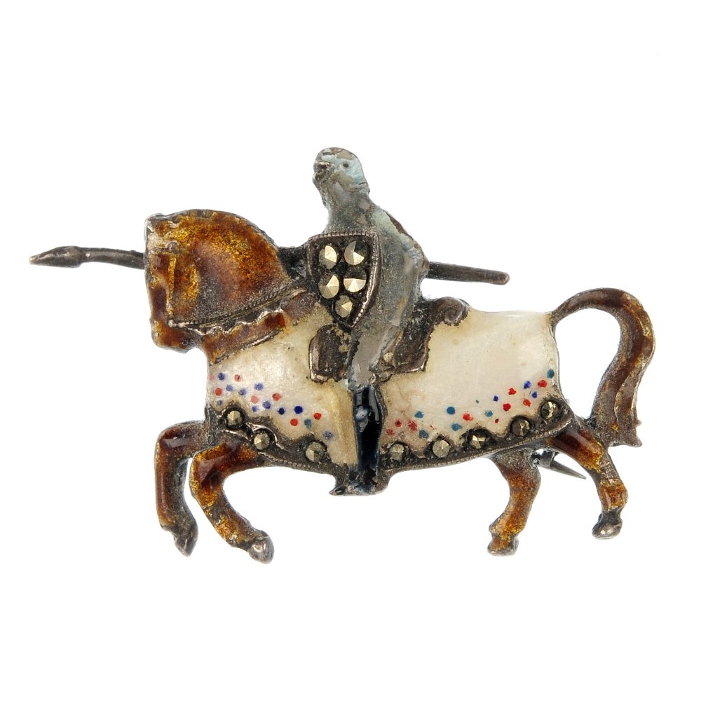 A quantity of costume jewellery.: A quantity of costume jewellery, to include a marcasite and enamel brooch depicting a jousting knight, an early 20th century silver butterfly wing brooch and two marcasite cocktail watches. Some AF. F