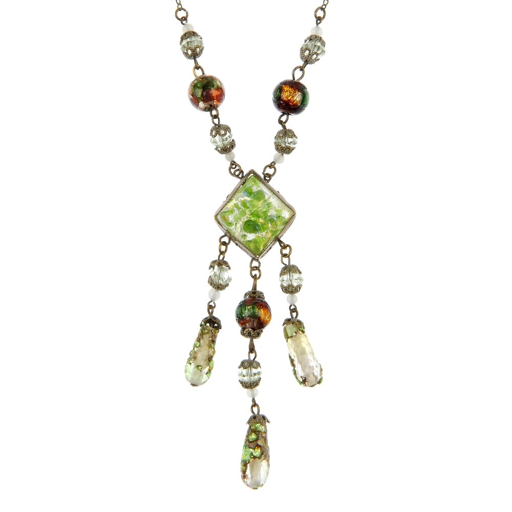 A quantity of early 20th century and later costume jewe: A quantity of early 20th century and later costume jewellery, to include an enamel bird of paradise brooch, together with an early 20th century paste pendant.