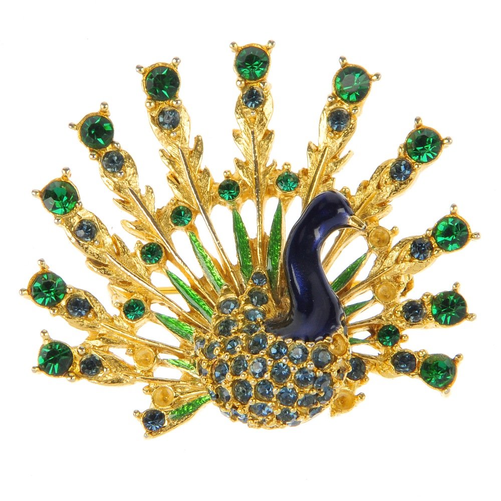 A selection of costume jewellery.: A selection of costume jewellery, to include a Sphinx peacock brooch and a Trifari leaf design link necklace.