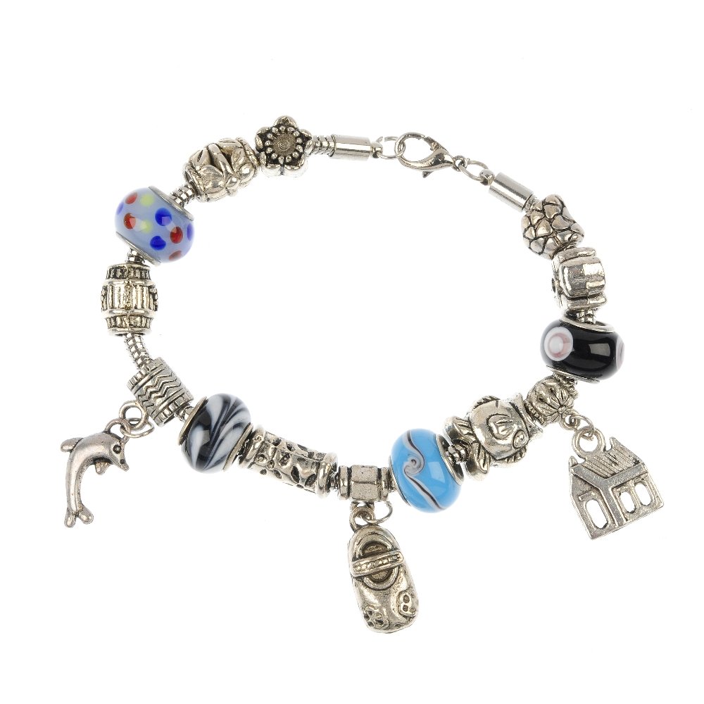 A quantity of costume jewellery.: A quantity of costume jewellery, to include a charm bracelet, a branch coral necklace and a shell cameo brooch. Some AF. Length of charm bracelet 20.5cms. Length of coral necklace 37cms. Length of cam