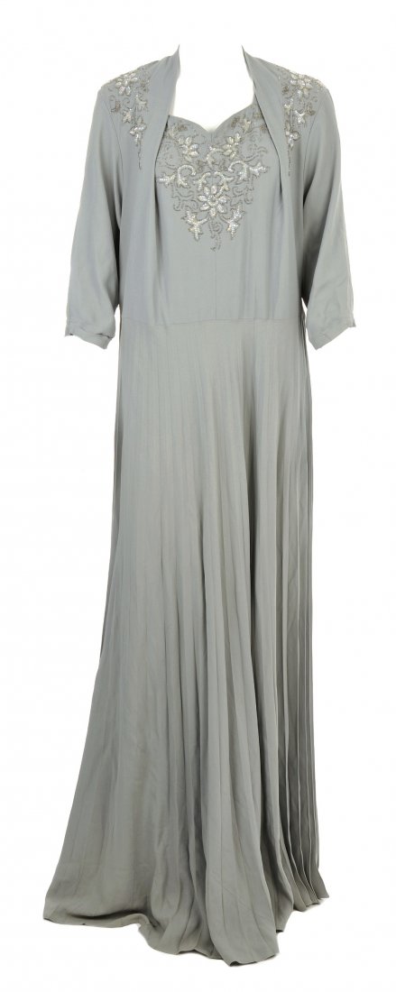 Three evening dresses: Three evening dresses to include, a Fiore purple lined, long sleeved shift dress with embroidered flowers and white side panel, a pink sleeveless square neckline dress with a sequin waist band and a g