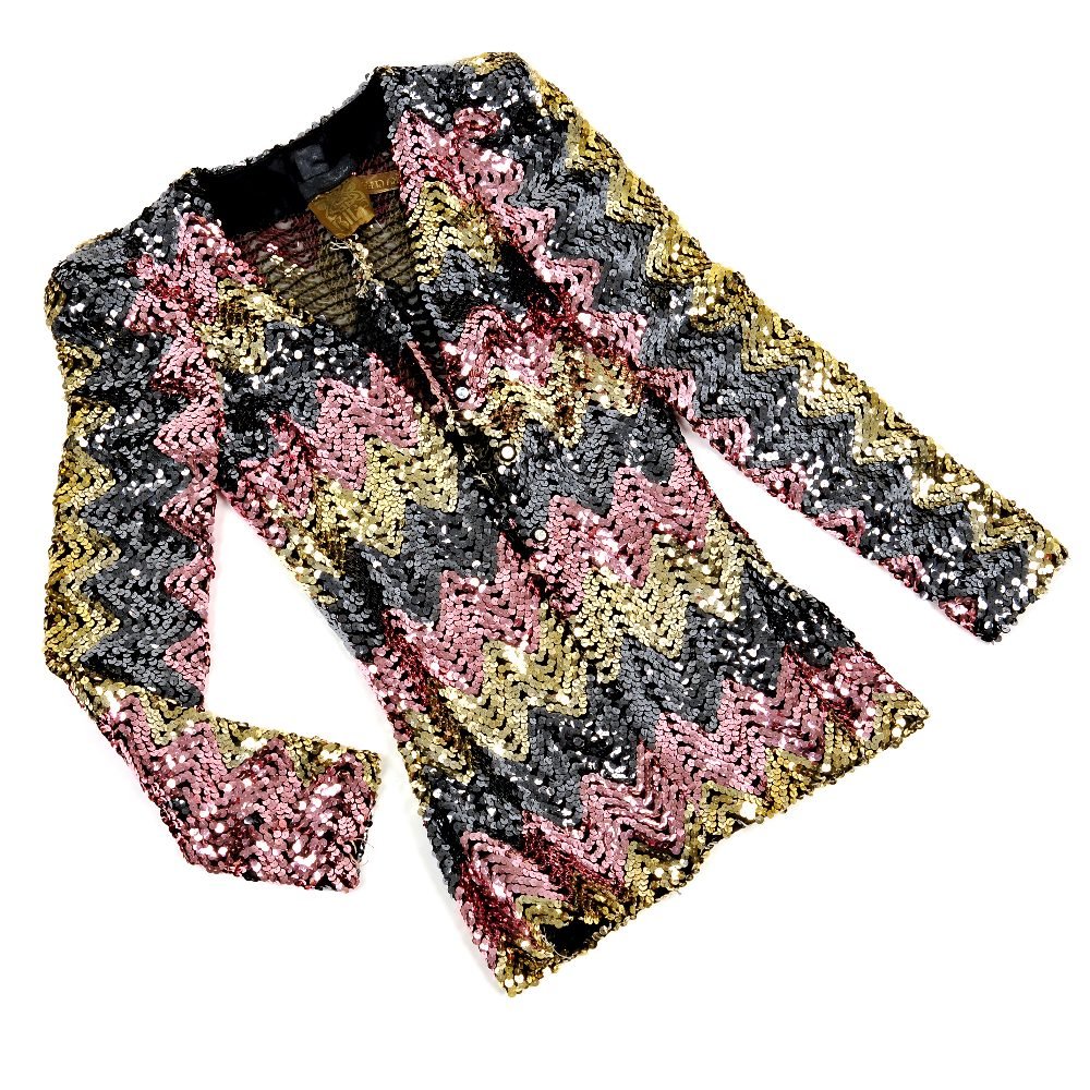 BIBA - a sequin jacket: BIBA - a 1970s multi-colour sequin, jacket with long sleeves and shoulder pads and three button fastenings. Believed to be a size 4. Labelled BIBA.