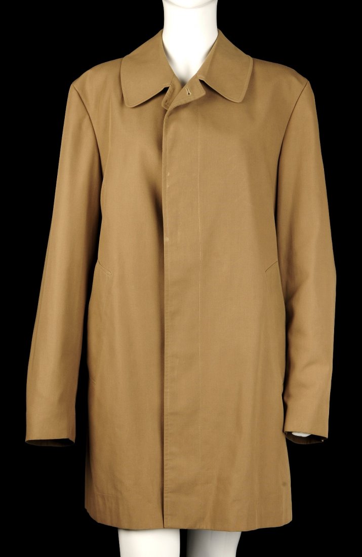 BURBERRY - a 1960s gentleman's trench coat.: BURBERRY - a 1960s gentleman's thigh length trench coat with covered button fastenings and two side pockets. Made in England. Size medium.