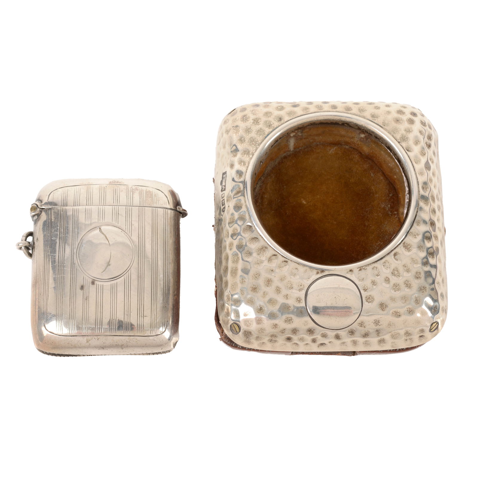 Silver mounted pocket watch case & vesta case: Silver mounted pocket watch case & vesta case An early 20th century silver mounted easel-back pocket watch case with planished mount and wooden back, hallmarked Finnigans Ltd., London, date letter rub