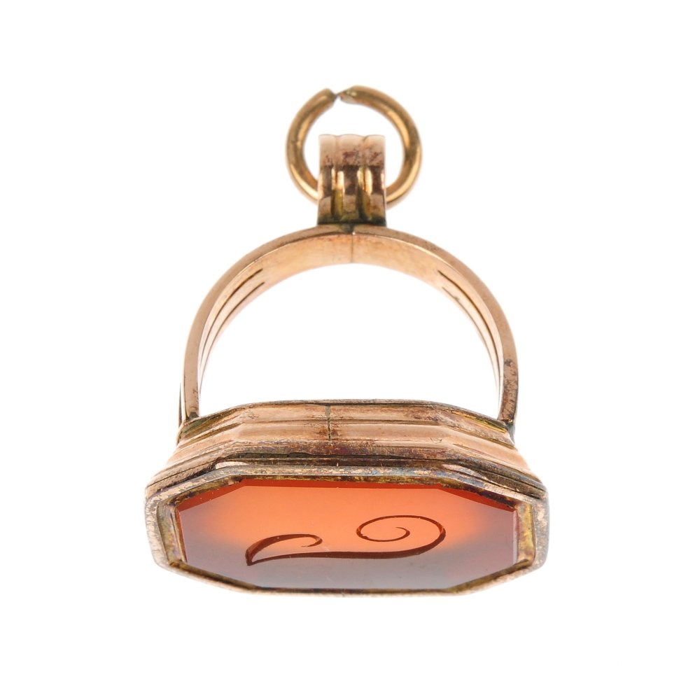 (529777-2-A) A selection of jewellery.: (529777-2-A) A selection of jewellery. To include a gentleman's 14ct gold diamond ring, a 9ct gold half-sovereign ring, a 9ct gold fancy-link chain, together with an early 20th century carnelian fob. 