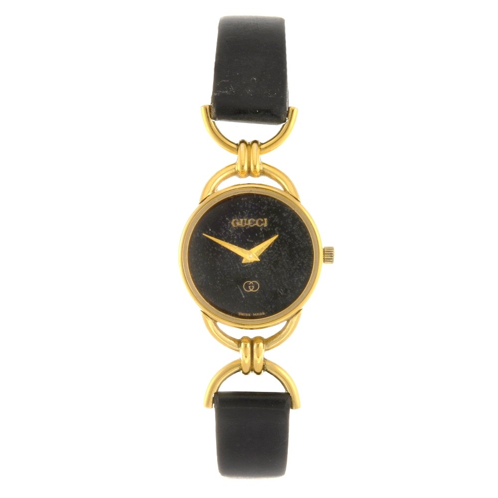 A gold plated quartz lady's Gucci 6000L 