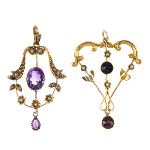 Two early 20th century 9ct gold split pearl and gem set: Two early 20th century 9ct gold split pearl and gem set pendants. Each designed as an amethyst or purple paste, suspended from an amethyst or purple paste with a split pearl scrolling surround. Length