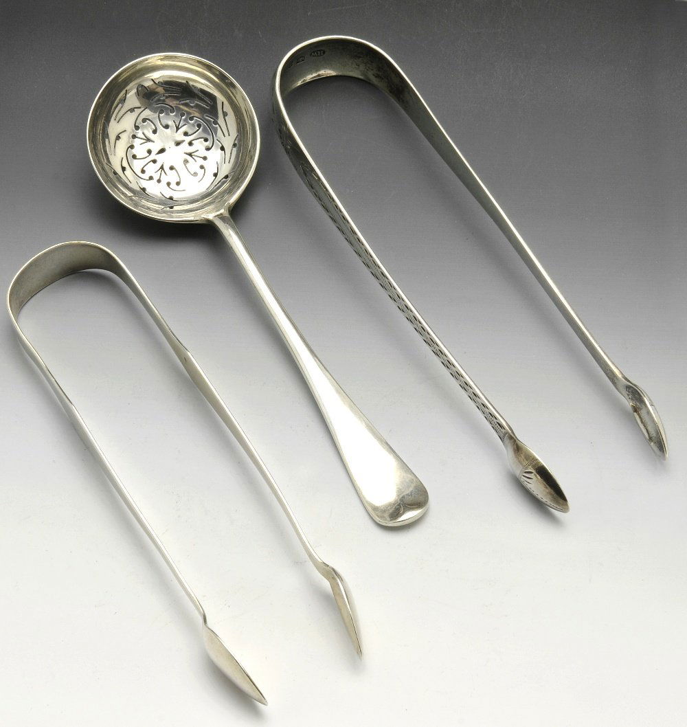 A pair of George III Scottish silver sugar nips, etc.: A pair of George III Scottish silver sugar nips with bright cut engravings by Robert Wilson, Edinburgh. Together with a further pair of George III silver sugar nips, London 1811, Edwardian silver suga