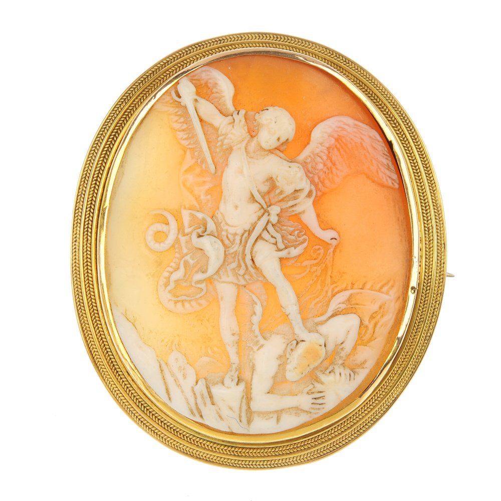 A late 19th century gold shell cameo brooch.: A late 19th century gold shell cameo brooch. The oval shell, carved to depict the Archangel Michael slaying the devil, to the rope-twist double surround. Length 5.5cms.