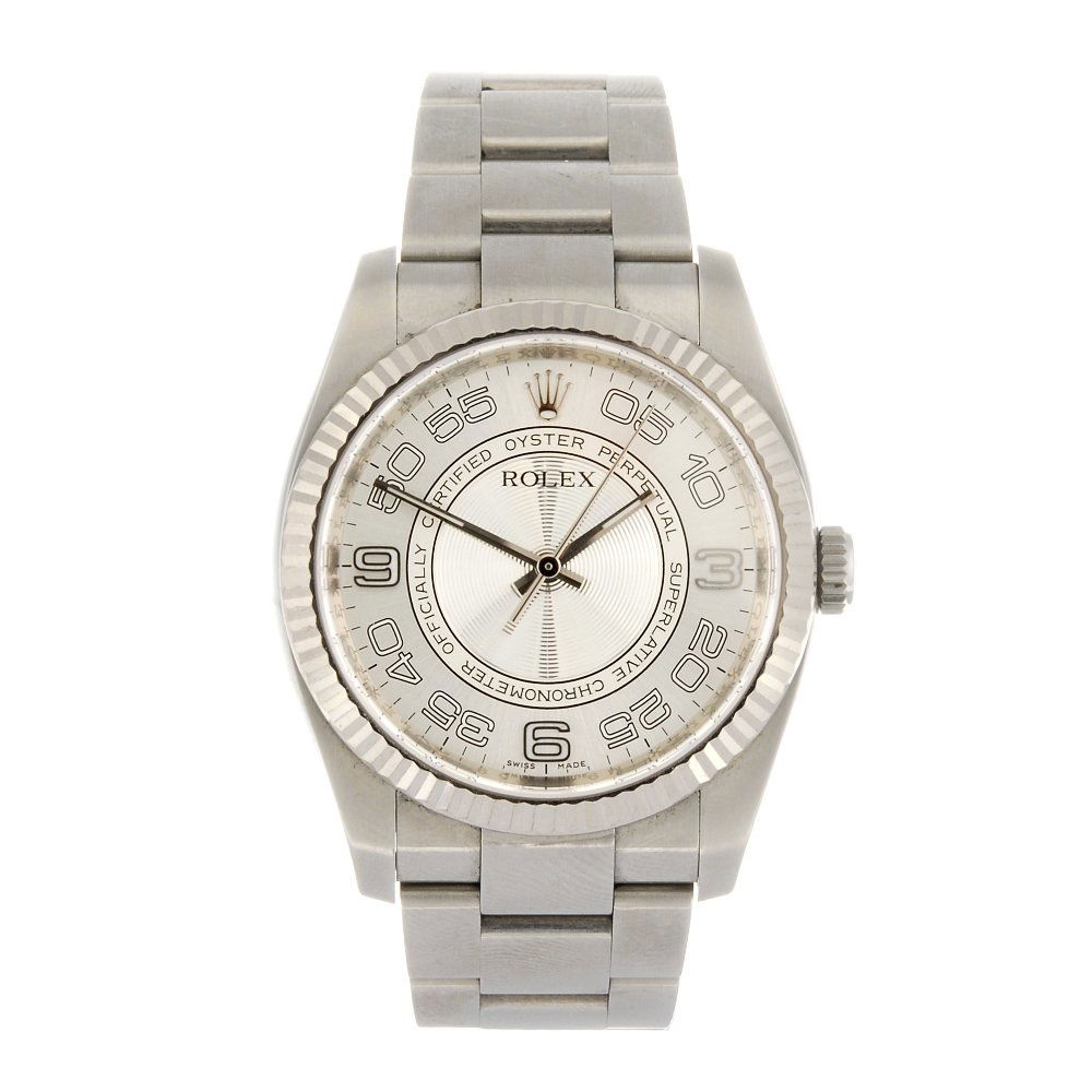 (111252) A stainless steel automatic gentleman's Rolex : (111252) ROLEX - a stainless steel automatic gentleman's Oyster Perpetual bracelet watch circa 2007, the two tone silvered dial with Arabic numerals, bordered by a minute track, fluted bezel, tonneau