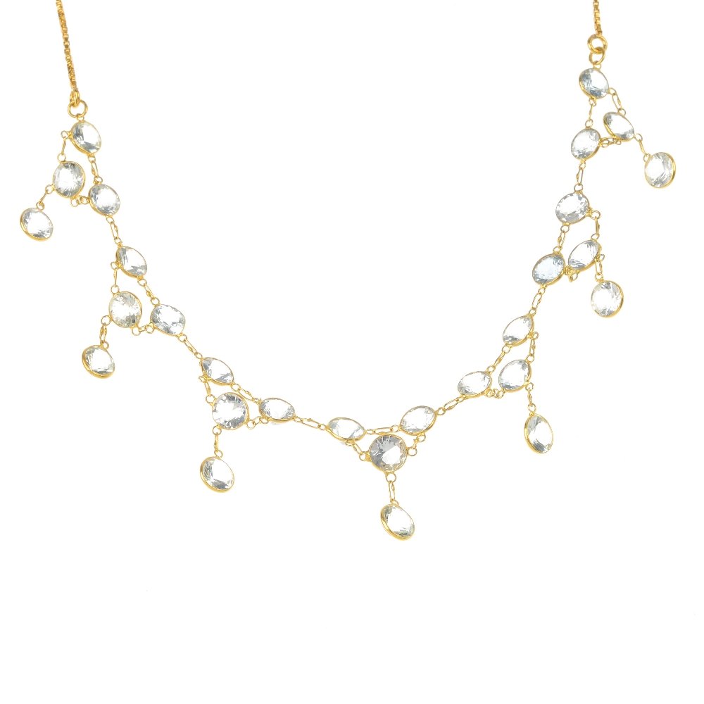 An aquamarine necklace.: An aquamarine necklace. Designed as a circular-shape aquamarine fringe, suspended from a similarly-set line to the box-link chain. Length 42cms. Weight 5.8gms.