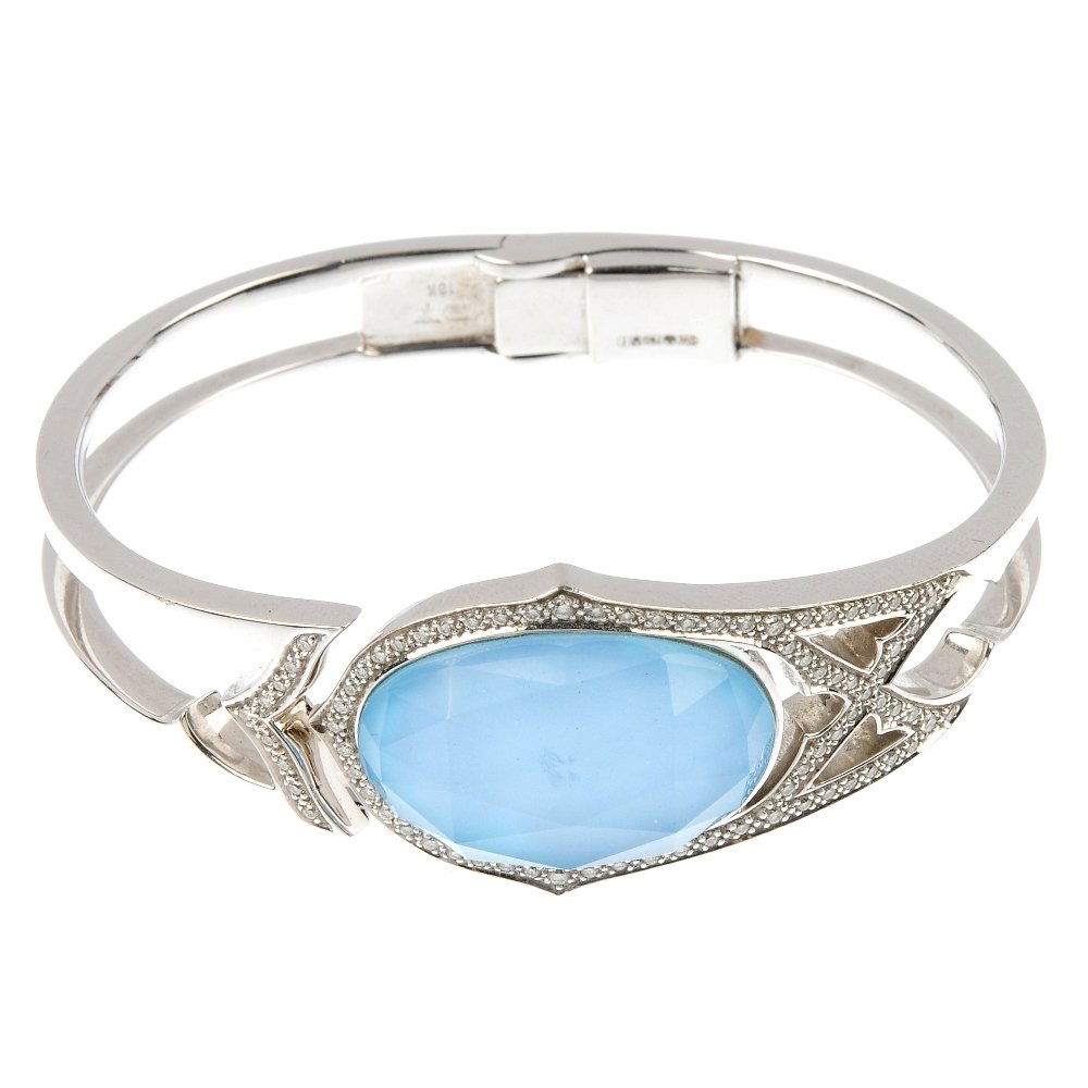 Stephen Webster - An 18ct Gold Turquoise, Rock Crystal: * STEPHEN WEBSTER - an 18ct gold turquoise, rock crystal and diamond 'Crystal Haze' hinged cuff. The front designed as a turquoise panel, with faceted rock crystal top, within a pave-set diamond surro