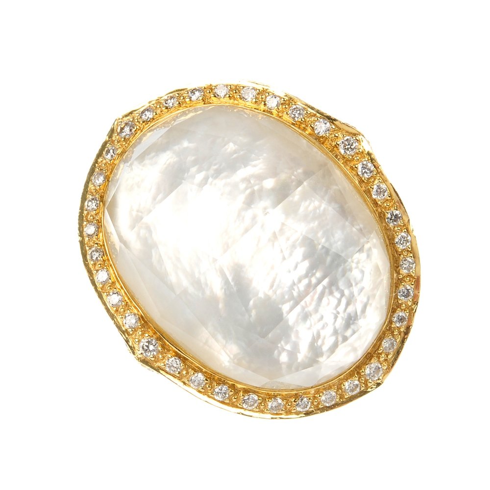STEPHEN WEBSTER - an 18ct gold mother-of-pearl, rock cr: * STEPHEN WEBSTER - an 18ct gold mother-of-pearl, rock crystal and diamond 'Crystal Haze' ring. The mother-of-pearl panel with faceted rock crystal top, to the pave-set diamond surround, bifurcated sh
