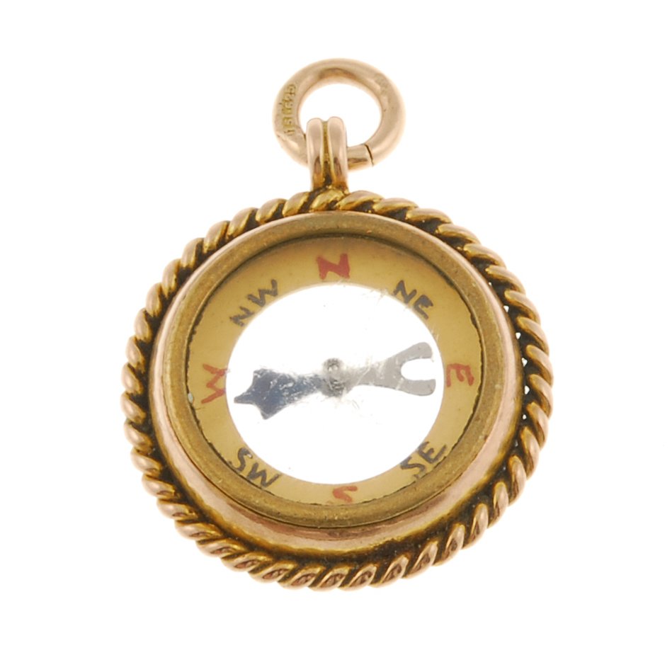 A group of pocket watch fobs.: A mixed group of four pocket watch fobs, to include two 9ct gold compass examples.