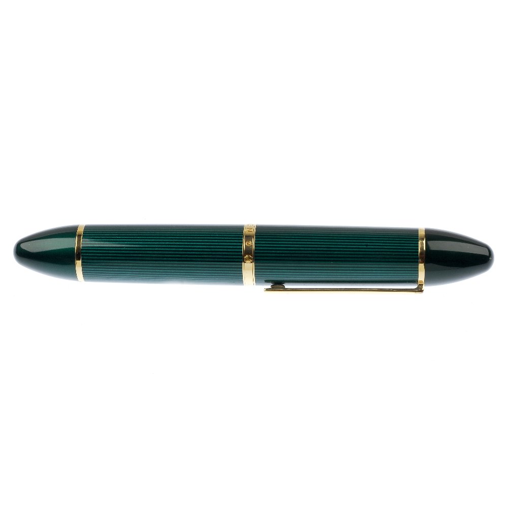 (110686) A louis Vuitton pen, the gold and enamel pen a: (110686) LOUIS VUITTON - an enamel fountain pen. The green and dark green striped enamel body, with green enamel tapered tips and Louis Vuitton detail. Length 14.7cms. With maker's case.