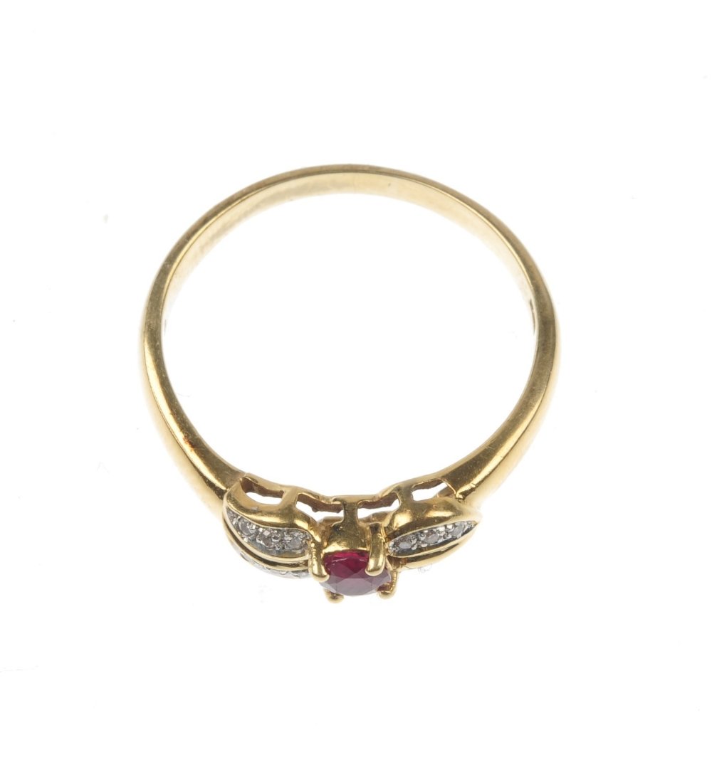 A ruby and diamond ring. - 3