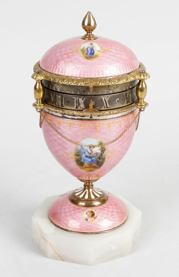 A fine Austrian enamel urn-form rotary clock