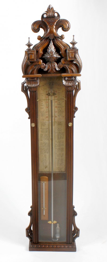 A Victorian carved walnut 'Admiral Fitzroy' barometer