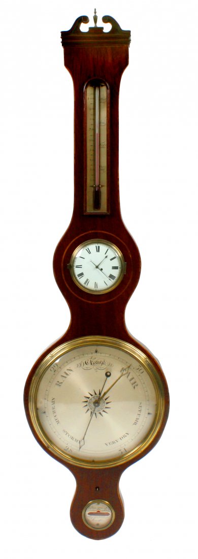 An early 19th century inlaid mahogany wheel barometer w