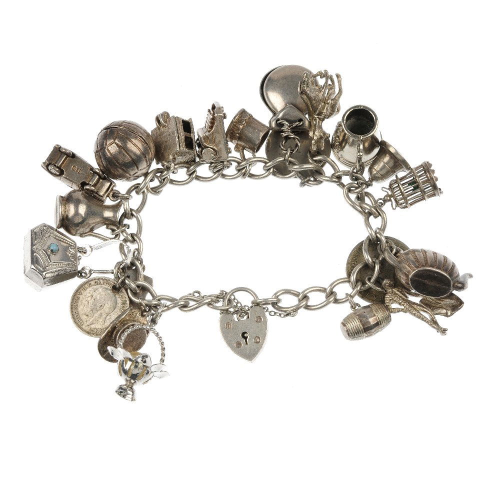 A selection of twelve silver charm bracelets and seven : A selection of twelve silver charm bracelets, totalling 161 charms, suspended from curb and trace-link chains, together with seven further loose charms including a Links of London 21 charm. Some with