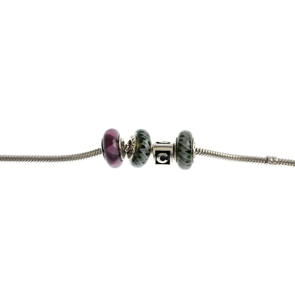 PANDORA - three charm bracelets with charms.: PANDORA - three charm bracelets with charms, the first comprising four charms, the second comprising two charms, and the third comprising three charms. Each bracelet with hallmarks for Edinburgh. Stam