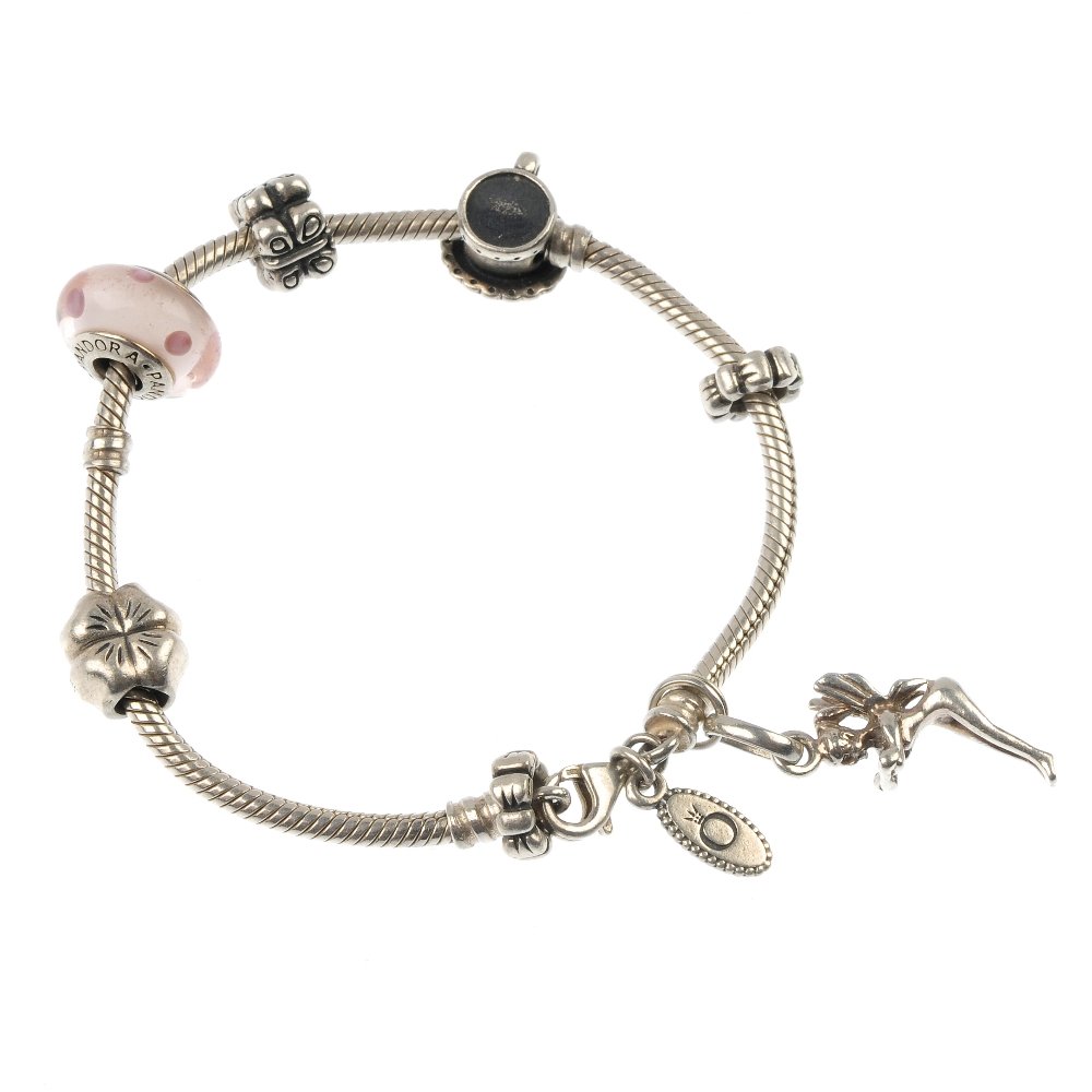 PANDORA - two charm bracelets.: PANDORA - two charm bracelets, suspending six Pandora charms and one Links of London charm, to the fancy-link bracelets. Maker's mark for Pandora and Links of London. Lengths 19.3 and 18cms. Weight 45